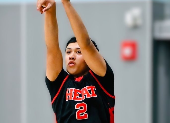 Athlete rising for a jump shot